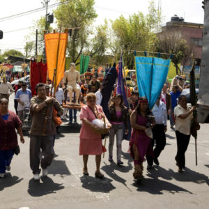 Alfadir Luna holds banners
