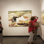 Patrons enjoying Erin Morrison exhibition.