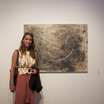 Artist Erin Morrison with her work.