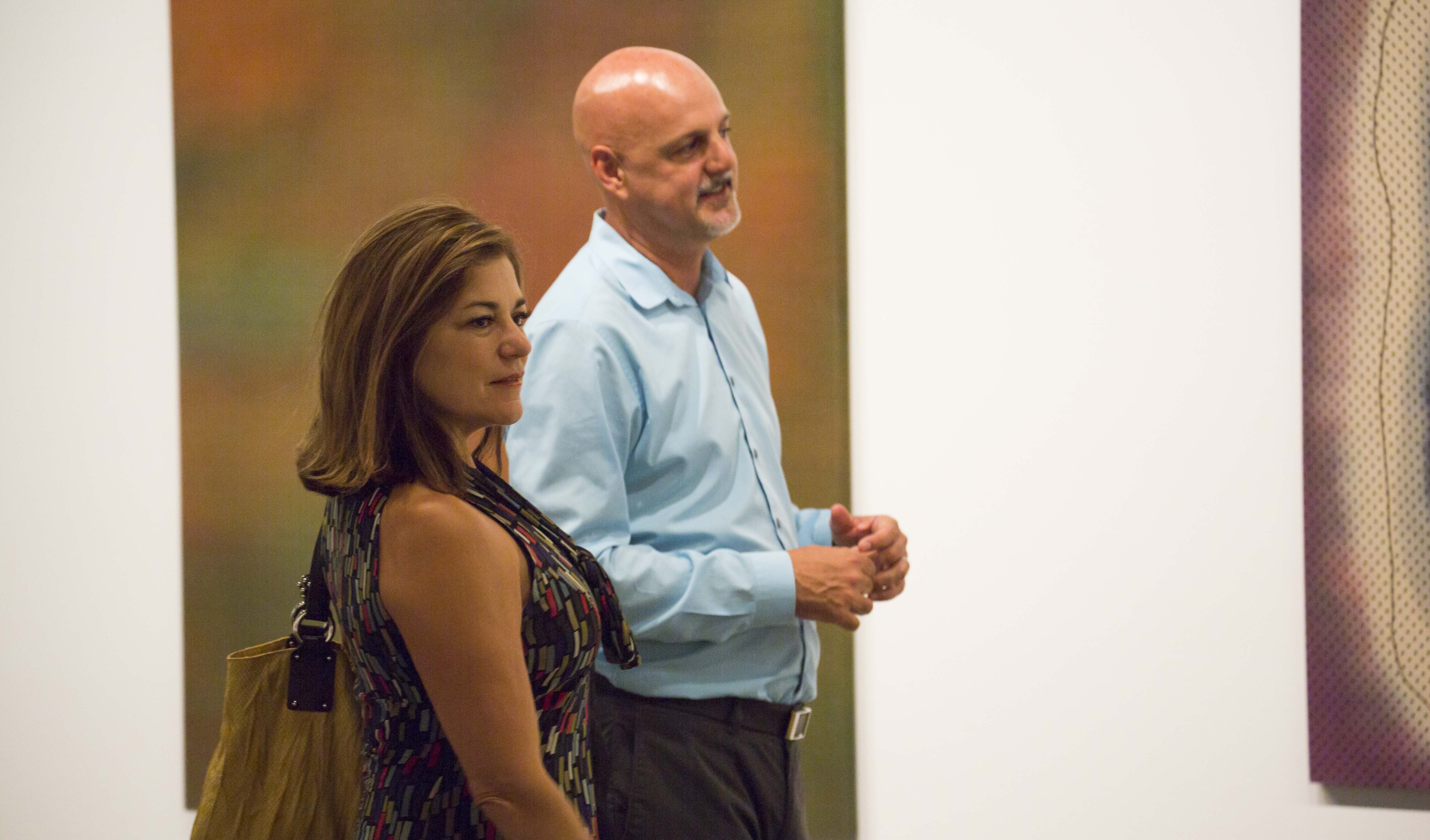 Congresswoman Loretta Sanchez and GCAC Director/Chief Curator John D. Spiak with the work of Tony de los Reyes.