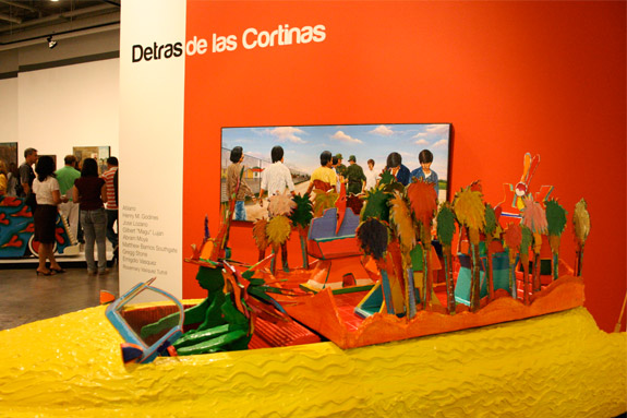 Install shot with entrance to exhibition and wall text
