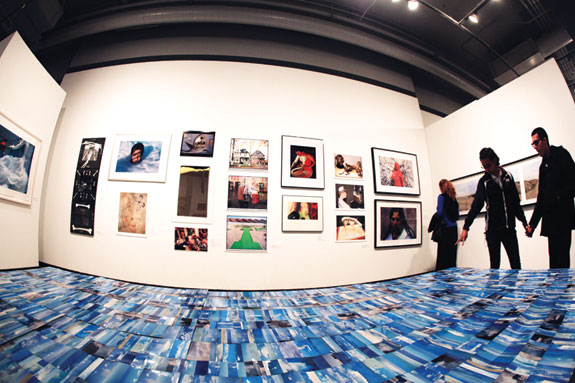 install shot of art exhibition, figures inside
