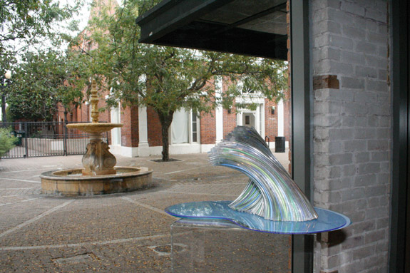 A glass sculpture in the window at GCAC.