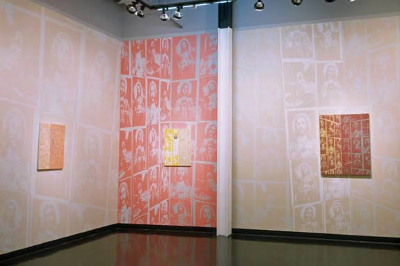 Installation shot of Jesus motifs projected onto canvas (Greg Drasler, 2005)