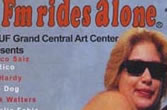 FM Rides Alone poster of woman in sunglasses