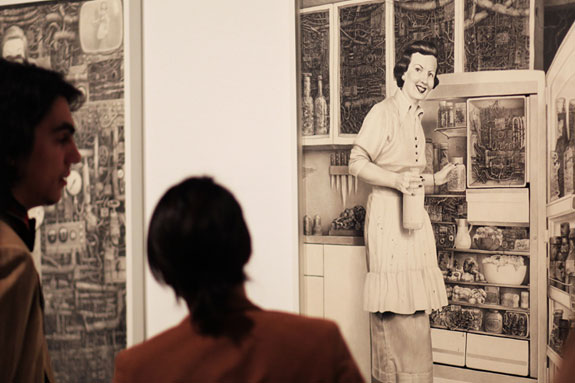 Patrons viewing the artwork