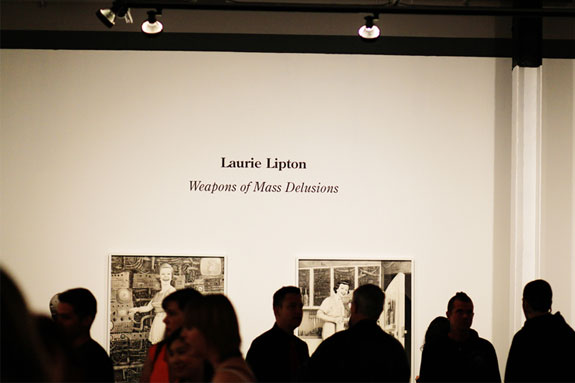 Patrons viewing the artwork