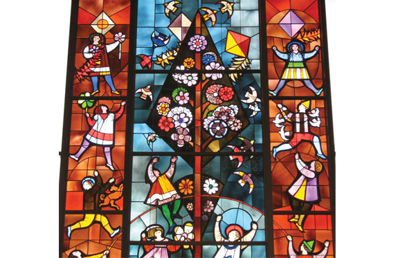 A medieval style stained glass window.