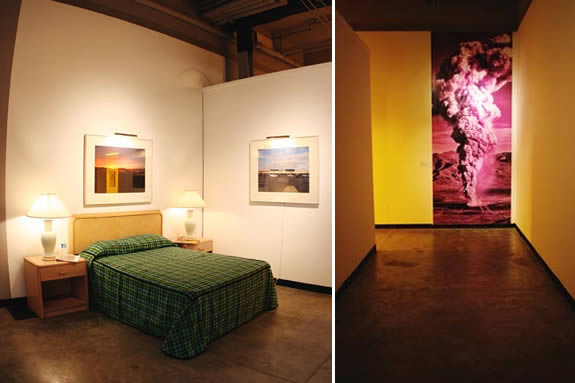 set up of a Bedroom and an image of a mushroom cloud.