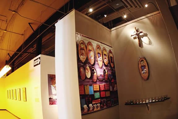 Wall of various artworks.