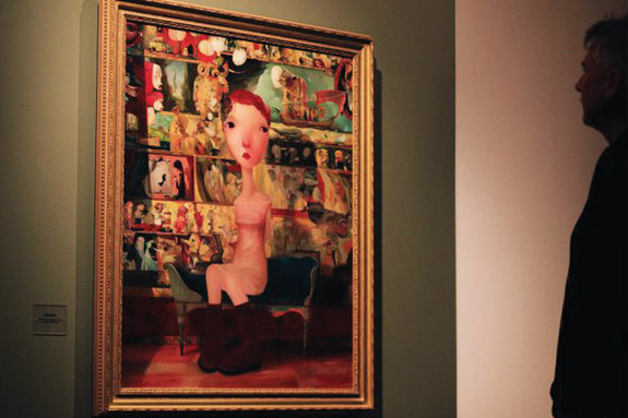 Figure looking at painting of a human figure with no arms sitting down in a chair