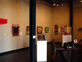 Installation shot of various works on wall and sculptures "Von Dutch: An American Original"
