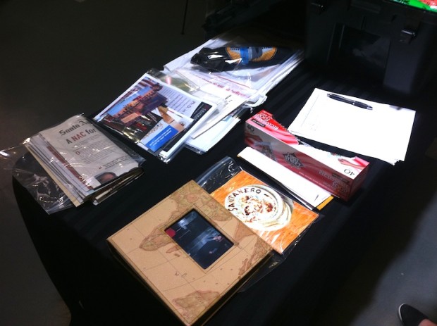 books and printed media laid on black table