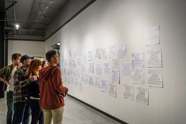 Audience members engage with Paul Ramirez Jonas: Public Trust, 2016