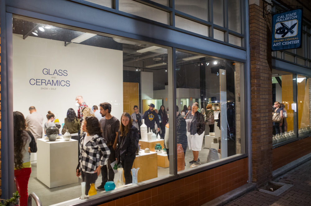 Patrons looking at the Glass and Ceramics show