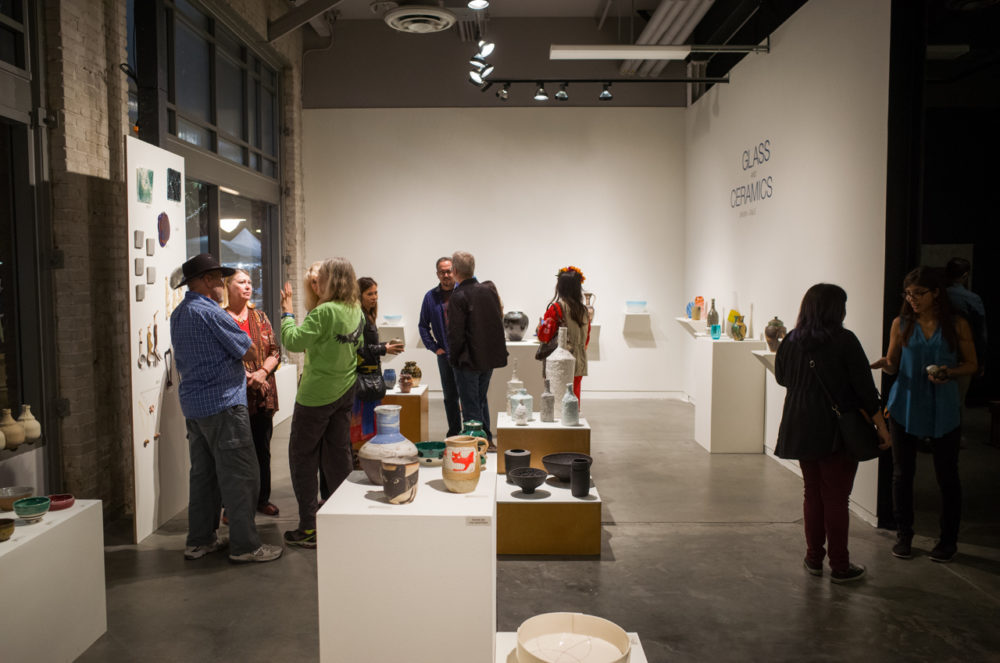 Patrons looking at the Glass and Ceramics show