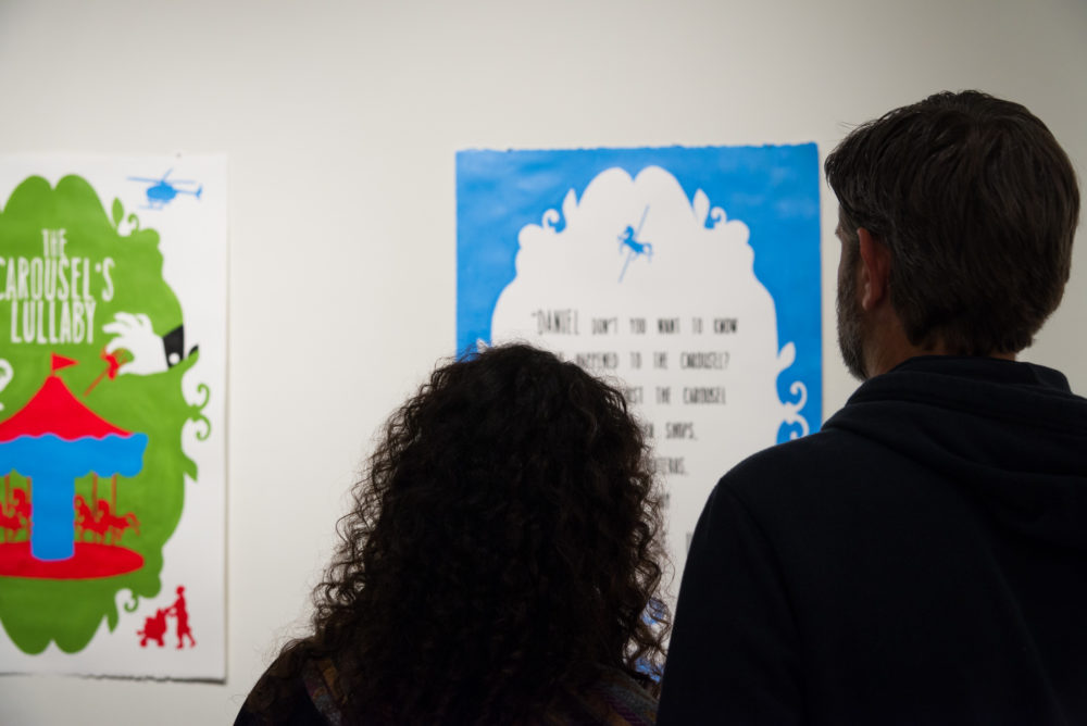 Sarah Rafael GarcÃƒ ­two patrons looking at art installation