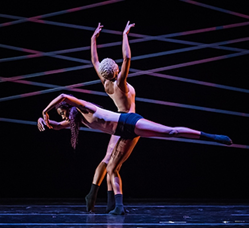Two contemporary dancers with blue background