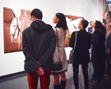 visitors viewing exhibition