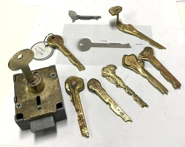 keys and a lock on a table