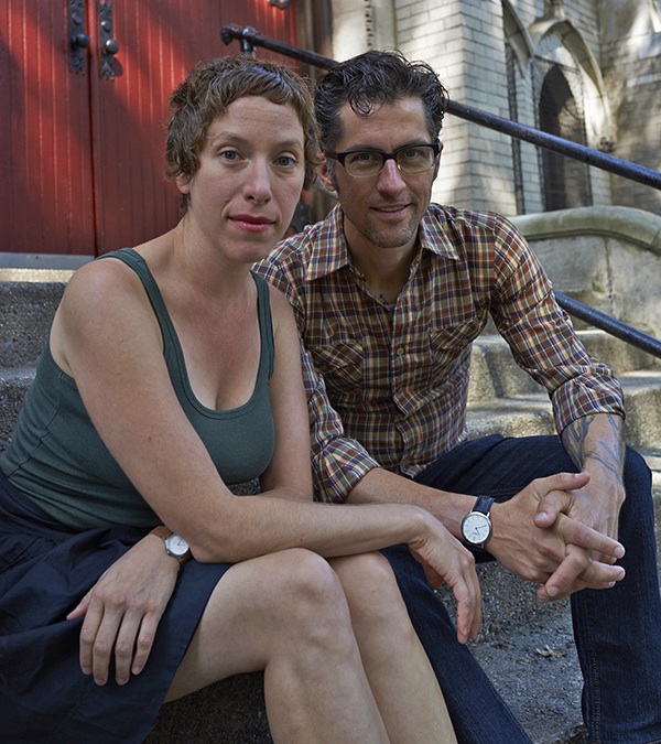 Susy Bielak and Fred Schmalz siting together on steps