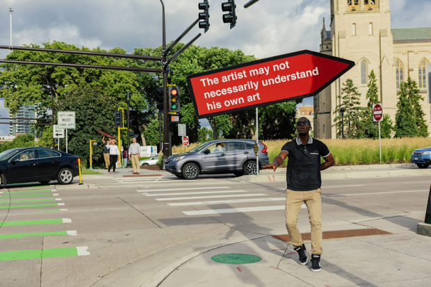 sign spinner spinning red sign