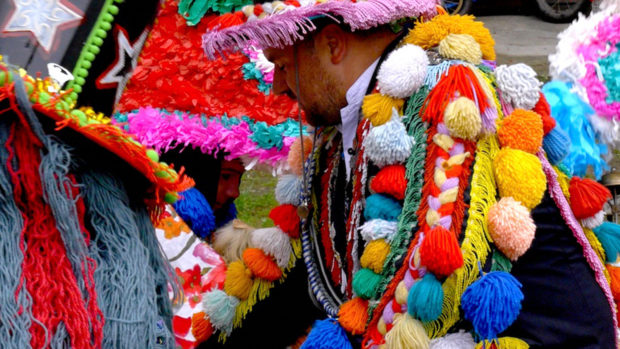 Individual wearing a traditional Slavic garment.